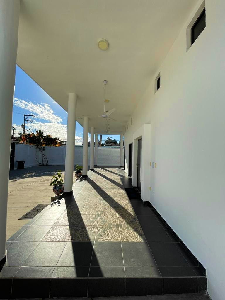 Fotografía del pasillo exterior de la casa